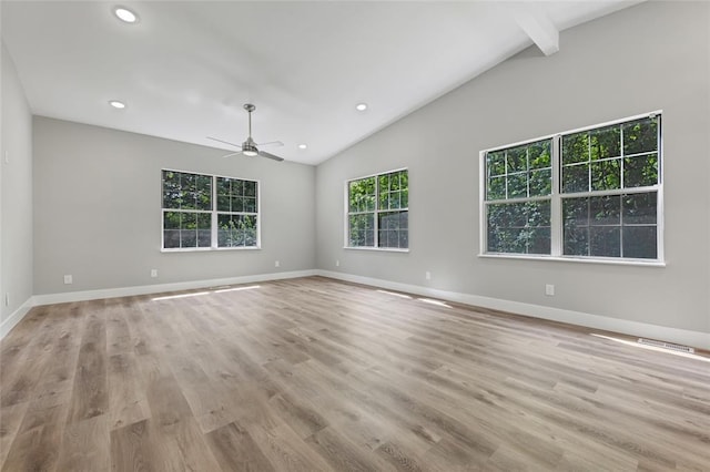 empty room with vaulted ceiling, a ceiling fan, baseboards, recessed lighting, and light wood-type flooring