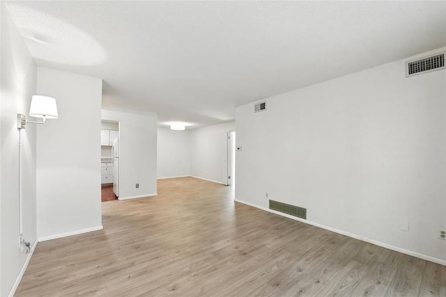 444 N Clay Ave Unit 2N, Kirkwood, MO 63122 - unfurnished room featuring light wood-type flooring and baseboards