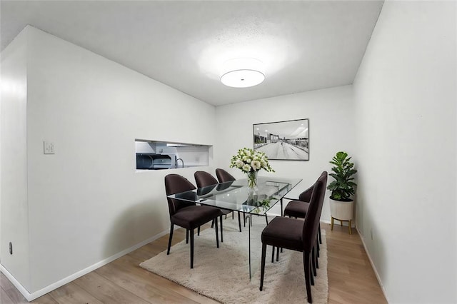 444 N Clay Ave Unit 2N, Kirkwood, MO 63122 - dining room featuring wood finished floors and baseboards