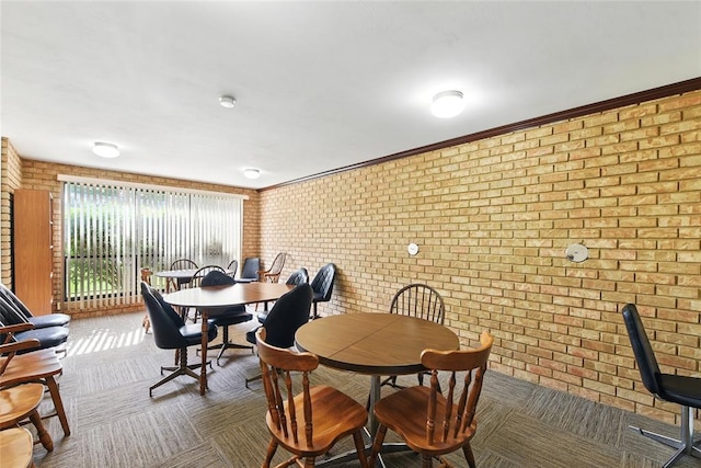 444 N Clay Ave Unit 2N, Kirkwood, MO 63122 - dining space with brick wall