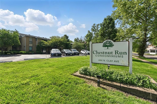 444 N Clay Ave Unit 2N, Kirkwood, MO 63122 - community sign with uncovered parking and a lawn