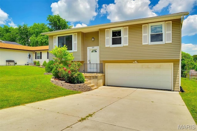 229 Stillbrook Estates Dr, Fenton, MO 63026 - raised ranch featuring a front lawn, concrete driveway, and an attached garage