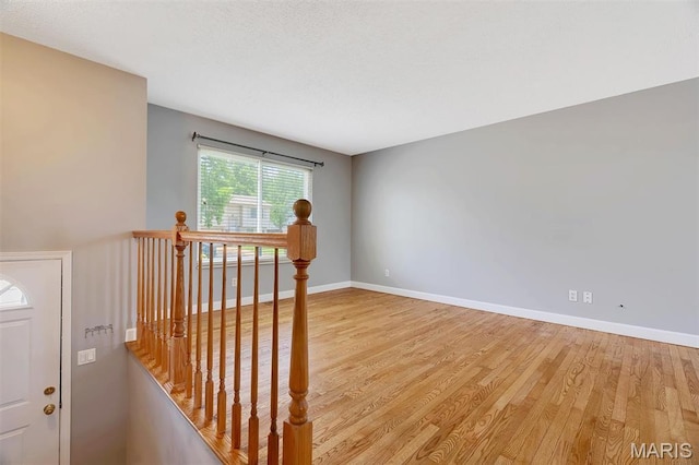 229 Stillbrook Estates Dr, Fenton, MO 63026 - empty room with light wood-type flooring and baseboards
