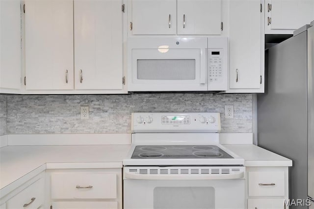 229 Stillbrook Estates Dr, Fenton, MO 63026 - kitchen with white appliances, light countertops, white cabinetry, and decorative backsplash