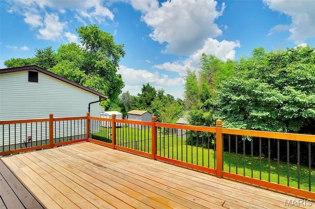 229 Stillbrook Estates Dr, Fenton, MO 63026 - deck featuring a fenced backyard, view of scattered trees, and an outdoor structure