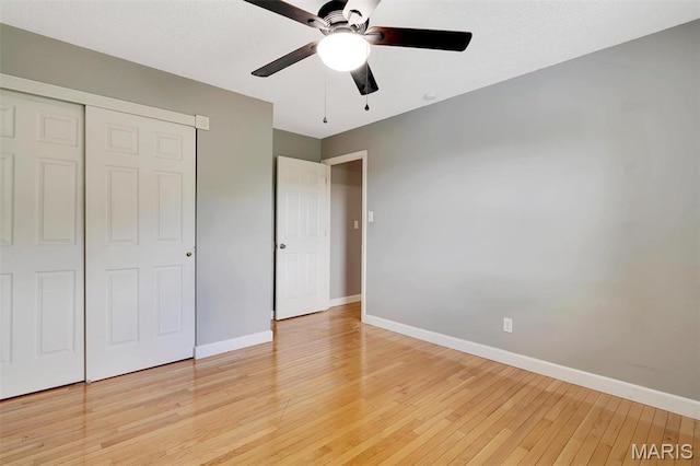 229 Stillbrook Estates Dr, Fenton, MO 63026 - unfurnished bedroom featuring light wood-style flooring, a closet, and ceiling fan