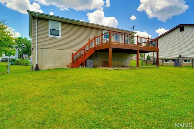 229 Stillbrook Estates Dr, Fenton, MO 63026 - back of property featuring a wooden deck, a fenced backyard, and stairs