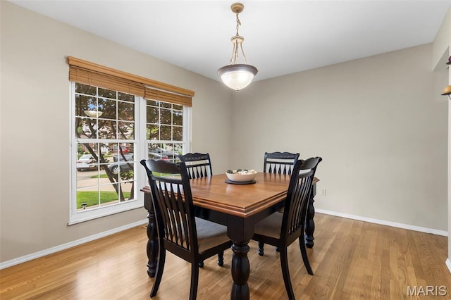 8 Baron Ridge Ct, Ofallon, MO 63366 - dining area featuring light wood-style floors and plenty of natural light