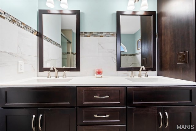 8 Baron Ridge Ct, Ofallon, MO 63366 - bathroom featuring double vanity and tile walls