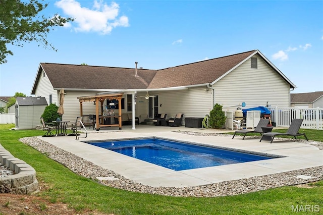 8 Baron Ridge Ct, Ofallon, MO 63366 - view of pool with a patio area, a shed, and an outdoor living space