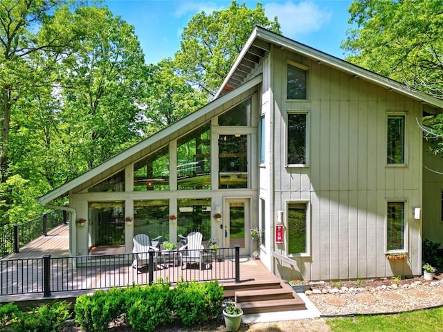 back of property with a deck