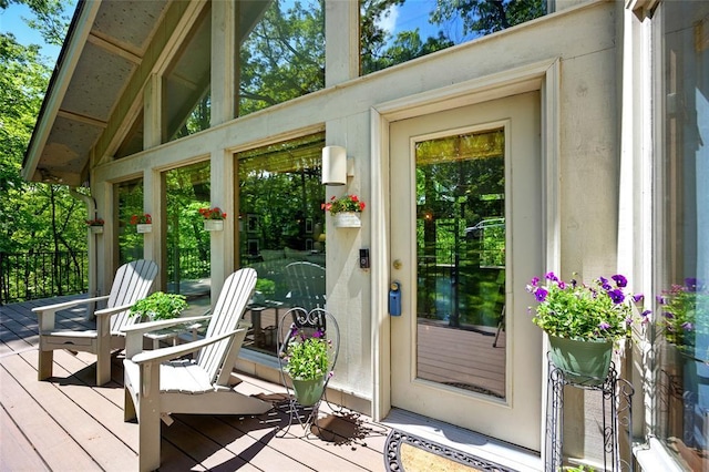 exterior space featuring plenty of natural light and vaulted ceiling