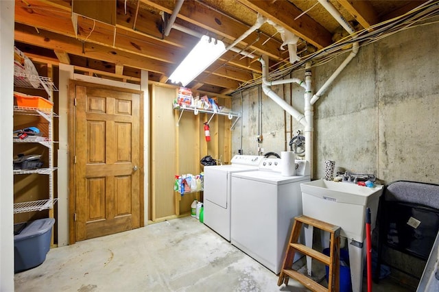 laundry area featuring washing machine and clothes dryer