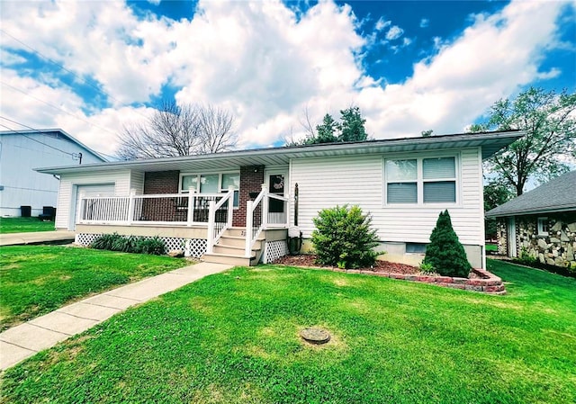 view of front of property with a porch and a front lawn