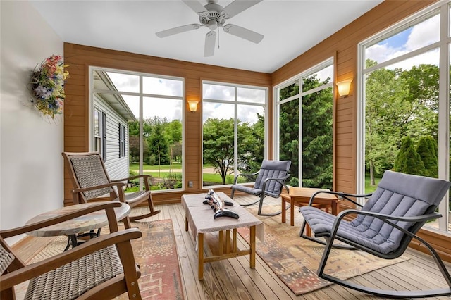 214 Townview Ct, Wentzville, MO 63385 - sunroom / solarium with a ceiling fan, hardwood / wood-style flooring, and wood walls