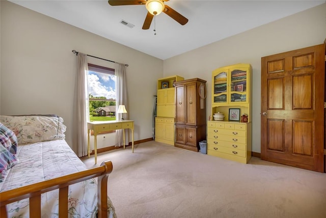214 Townview Ct, Wentzville, MO 63385 - bedroom featuring light carpet, baseboards, and a ceiling fan