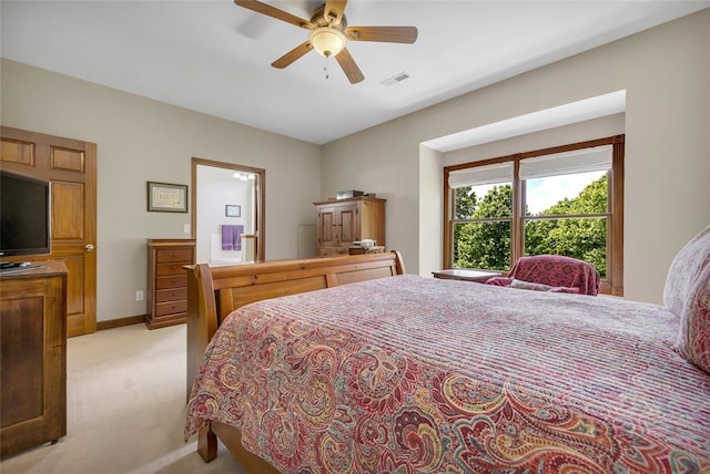 214 Townview Ct, Wentzville, MO 63385 - bedroom with light colored carpet, ceiling fan, and baseboards