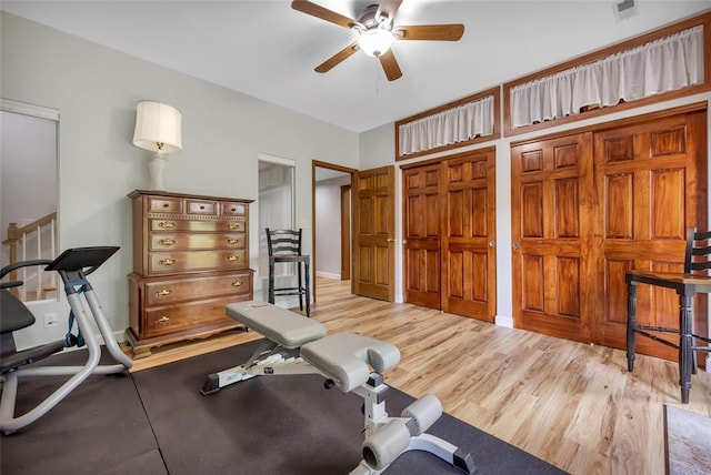 214 Townview Ct, Wentzville, MO 63385 - workout area featuring a ceiling fan and wood finished floors