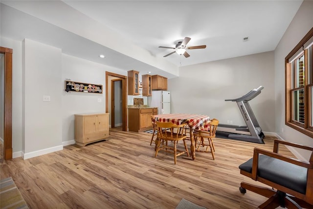 214 Townview Ct, Wentzville, MO 63385 - dining space with light wood-type flooring, a ceiling fan, baseboards, and recessed lighting