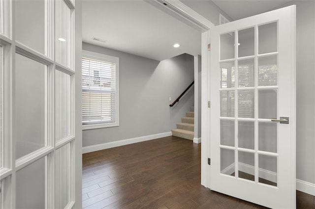 8000 Central Park Dr, Richmond Heights, MO 63117 - foyer with baseboards, stairs, dark wood-type flooring, and recessed lighting