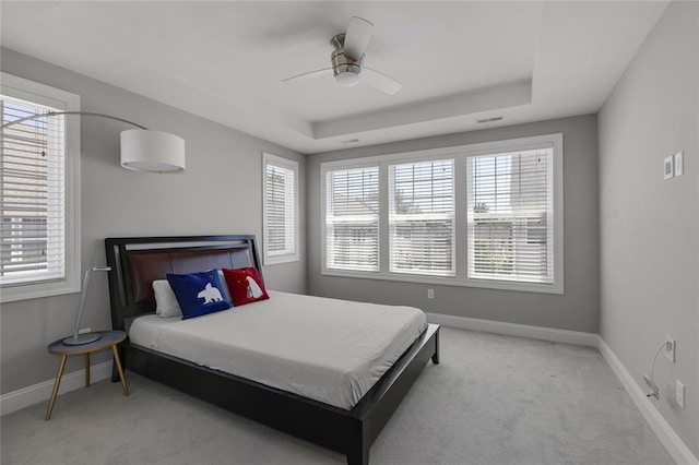 8000 Central Park Dr, Richmond Heights, MO 63117 - carpeted bedroom featuring baseboards, ceiling fan, and a raised ceiling