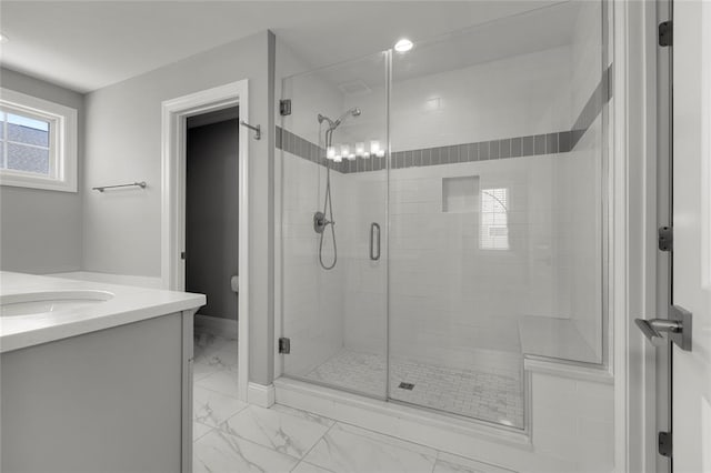 8000 Central Park Dr, Richmond Heights, MO 63117 - bathroom featuring marble look tile flooring, a shower stall, vanity, and toilet