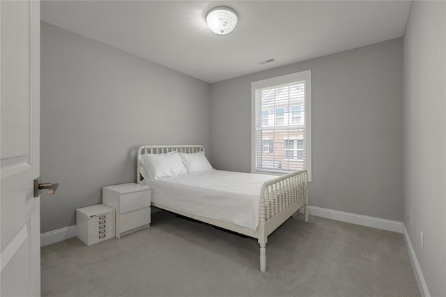 8000 Central Park Dr, Richmond Heights, MO 63117 - bedroom featuring light colored carpet and baseboards