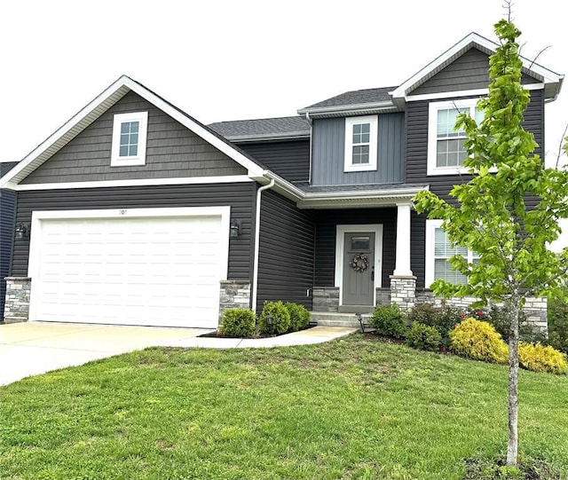 207 Still Creek Dr, Lake St Louis, MO 63367 - craftsman-style house featuring stone siding, board and batten siding, a garage, driveway, and a front lawn