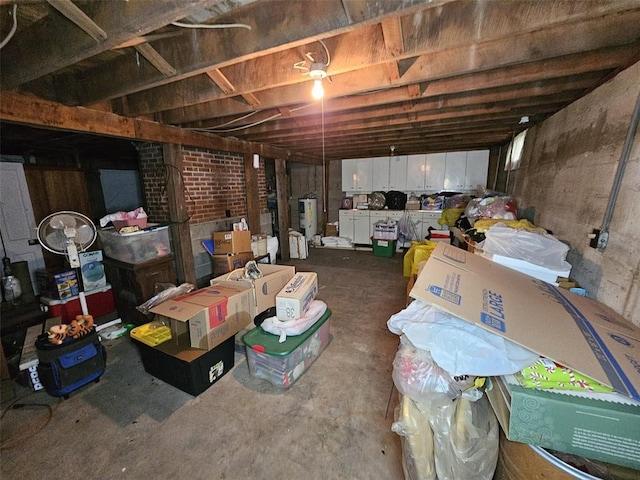unfinished basement with water heater