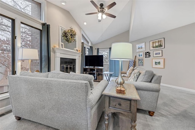 13645 Mason Oaks Dr, Missouri River Township, MO 63131 - living area featuring a ceiling fan, baseboards, lofted ceiling, carpet, and a glass covered fireplace