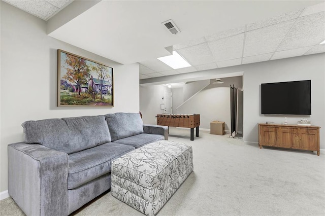 13645 Mason Oaks Dr, Missouri River Township, MO 63131 - living area with a paneled ceiling, carpet flooring, and baseboards