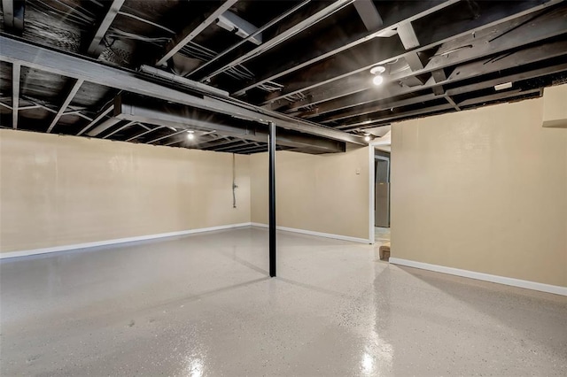 finished below grade area featuring baseboards