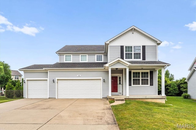 508 Frost Ct, Ofallon, IL 62269 - traditional home with concrete driveway, a front lawn, and a garage