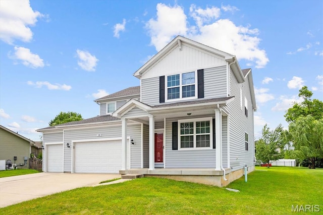 508 Frost Ct, Ofallon, IL 62269 - traditional home featuring covered porch, driveway, a front yard, and an attached garage