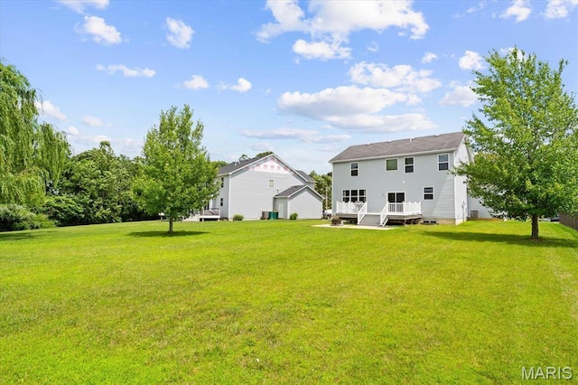 508 Frost Ct, Ofallon, IL 62269 - rear view of property with a yard and a wooden deck