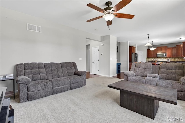508 Frost Ct, Ofallon, IL 62269 - living room featuring light colored carpet and a ceiling fan