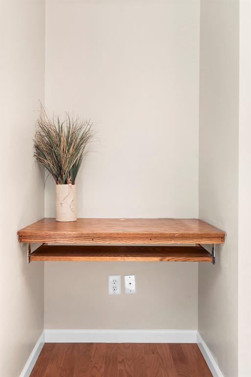 1131 Welsh Dr, Lake St Louis, MO 63367 - detailed view of baseboards and wood finished floors