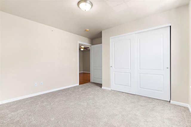 1131 Welsh Dr, Lake St Louis, MO 63367 - unfurnished bedroom featuring carpet floors, a closet, and baseboards