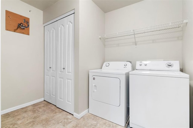 1131 Welsh Dr, Lake St Louis, MO 63367 - laundry area with independent washer and dryer and baseboards