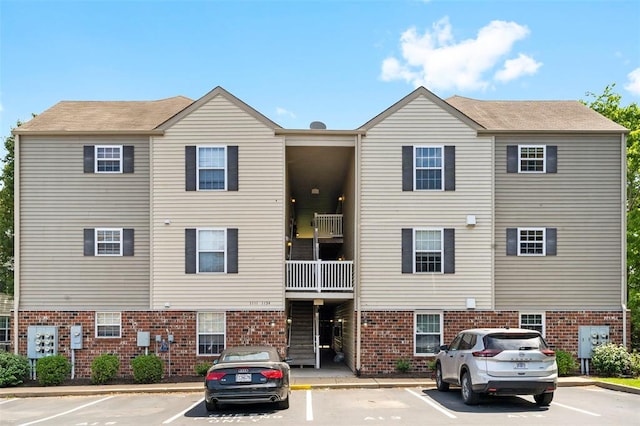 1131 Welsh Dr, Lake St Louis, MO 63367 - view of building exterior with uncovered parking