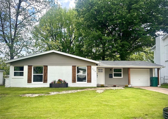 ranch-style house with driveway, a garage, a front lawn, and brick siding