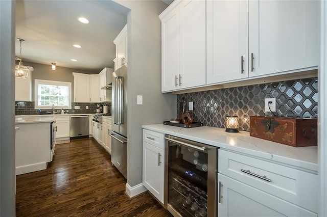 1026 Barry Ct, Kirkwood, MO 63122 - kitchen featuring beverage cooler, stainless steel appliances, backsplash, dark wood-style flooring, and recessed lighting