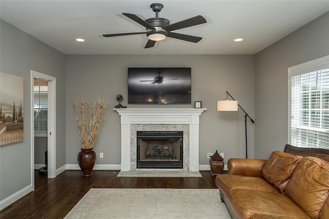 1026 Barry Ct, Kirkwood, MO 63122 - living room with wood finished floors, plenty of natural light, ceiling fan, a premium fireplace, and recessed lighting