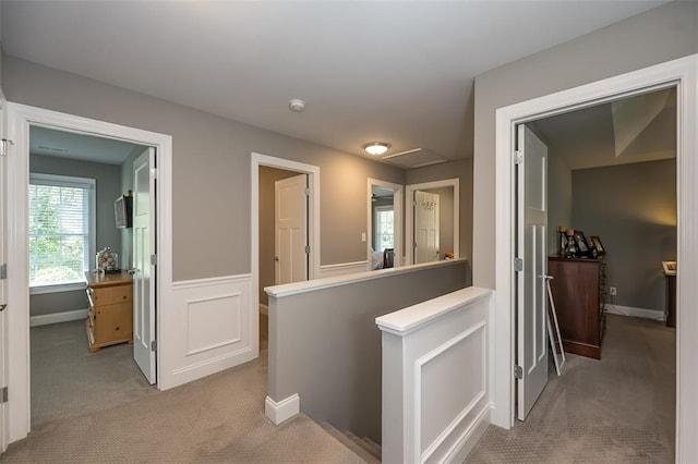 1026 Barry Ct, Kirkwood, MO 63122 - corridor featuring carpet flooring, an upstairs landing, and a wainscoted wall