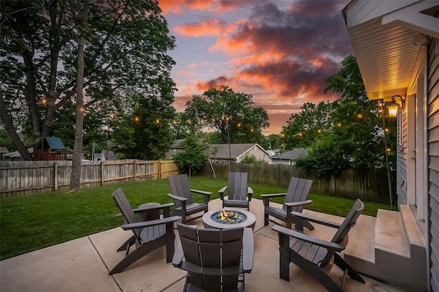 1026 Barry Ct, Kirkwood, MO 63122 - patio terrace at dusk featuring a fire pit