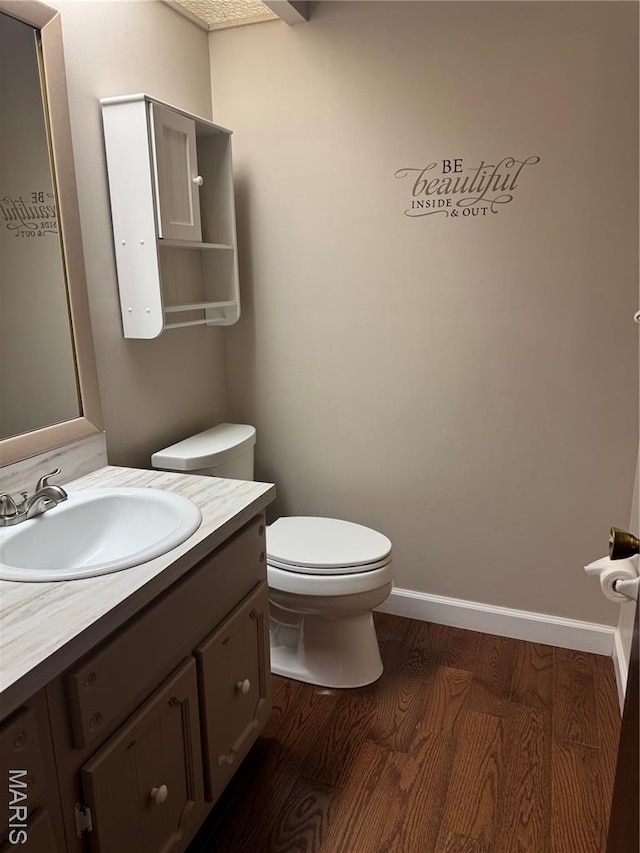 5810 White Pine Dr, Saint Louis, MO 63129 - bathroom with wood finished floors and vanity