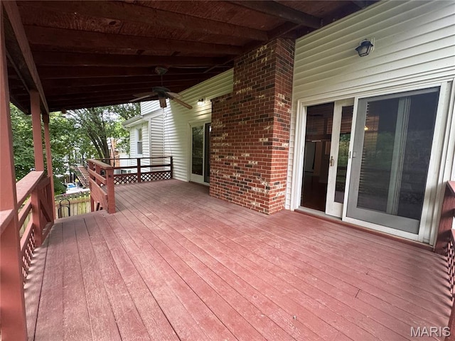 5810 White Pine Dr, Saint Louis, MO 63129 - wooden deck featuring a ceiling fan