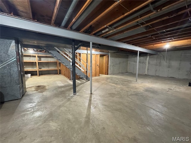 5810 White Pine Dr, Saint Louis, MO 63129 - unfinished below grade area featuring stairway