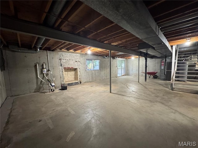 5810 White Pine Dr, Saint Louis, MO 63129 - below grade area with stairway and heating unit