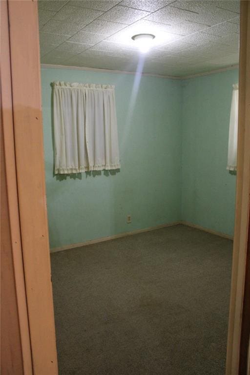 empty room with carpet flooring